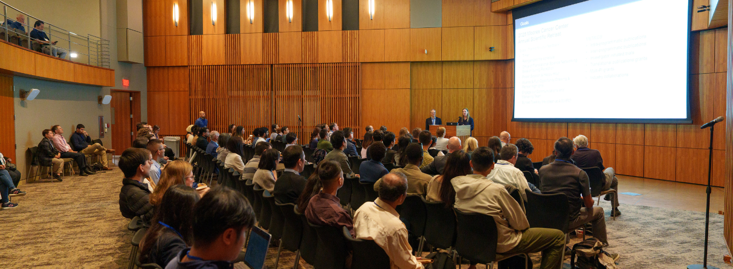 2 of 3, attendees listening to speaker