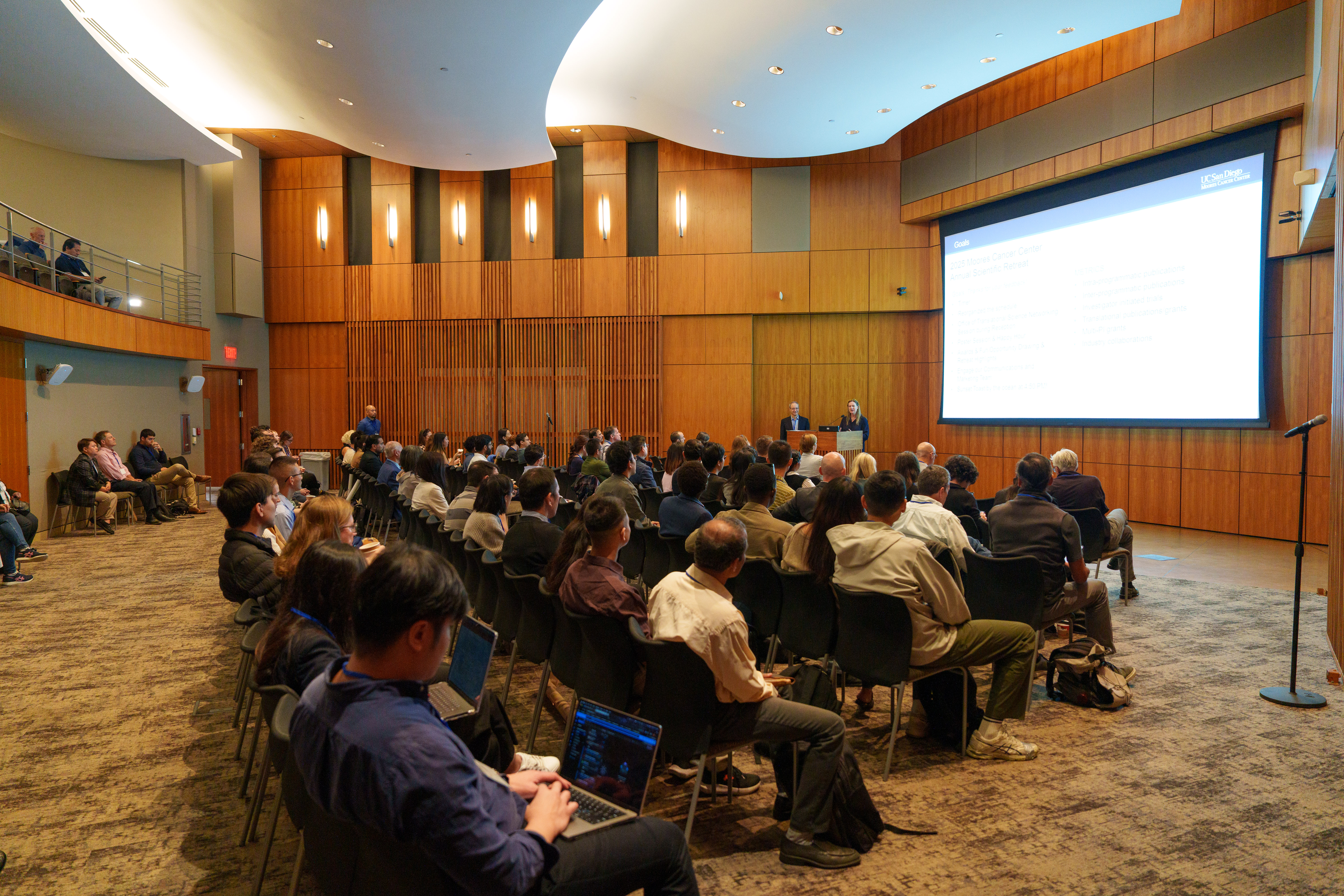 Annual retreat Moores Cancer Center presenter and audience